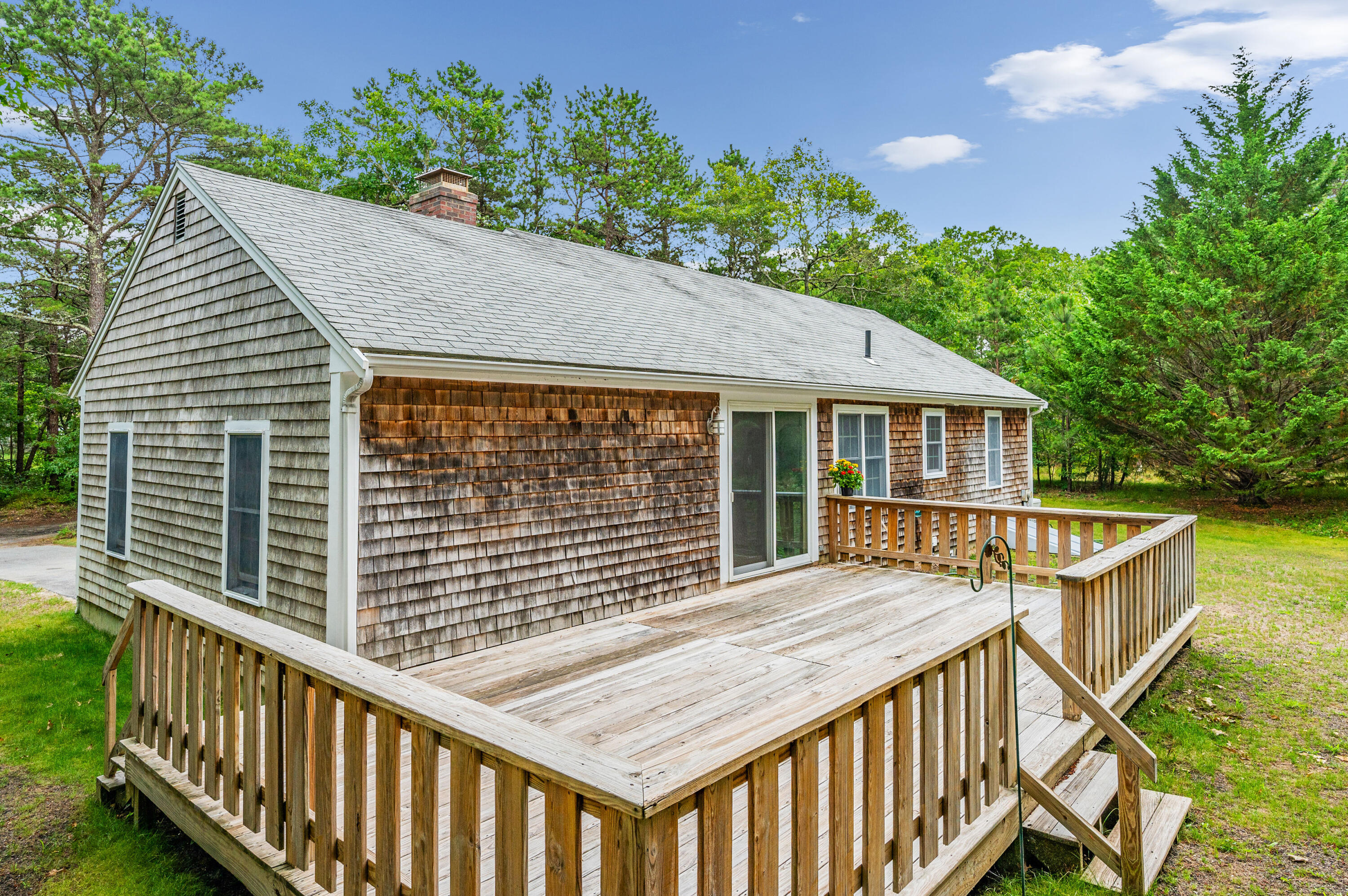 9 Tarragon Circle Cotuit, MA 02635 - Photo 20 of 28 a balcony view with a seating space