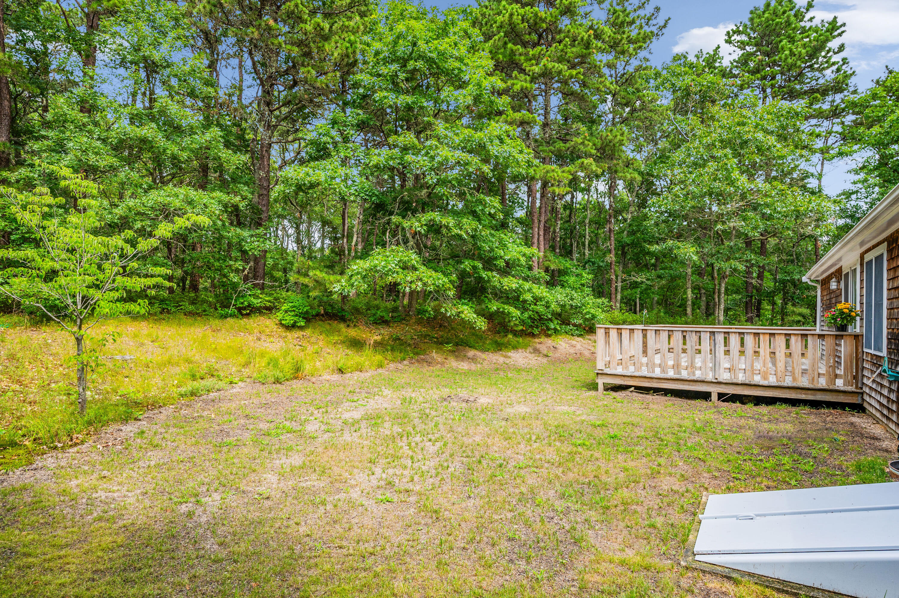9 Tarragon Circle Cotuit, MA 02635 - Photo 22 of 28 a view of a yard with swimming pool