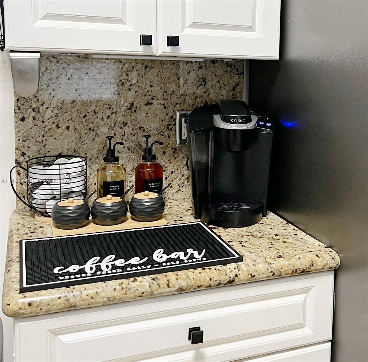 20124 Southwest 129th Place, Unit 20124 Miami, FL 33177 - Photo 14 of 31 a close view of a stove