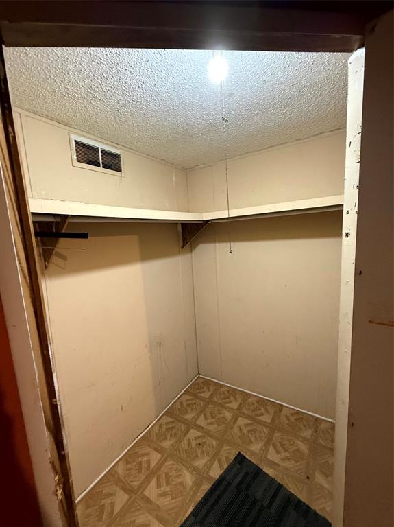 1047 John Wayne Road Kaufman, TX 75142 - Photo 17 of 17 Walk in closet featuring light floors
