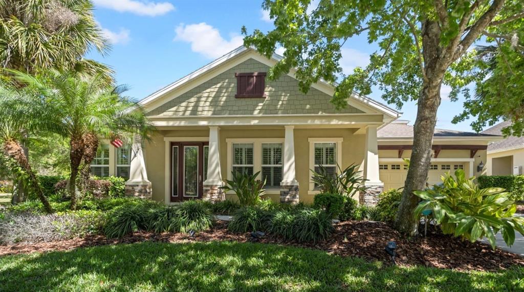 15902 Oakleaf Run Drive Lithia, FL 33547 - Photo 1 of 1 a front view of a house with a garden