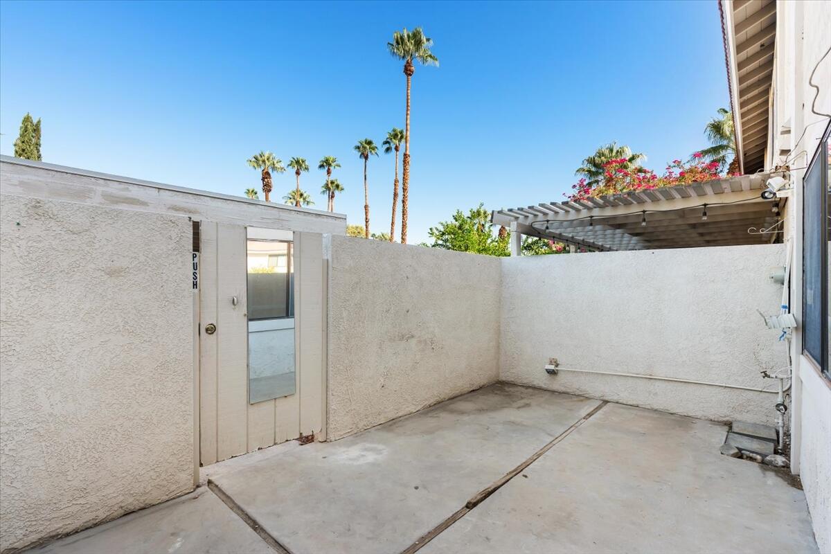 6117 Arroyo Road, Unit 4 Palm Springs, CA 92264 - Photo 15 of 26 048-427795- rear (1)
