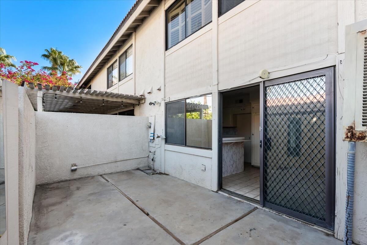 6117 Arroyo Road, Unit 4 Palm Springs, CA 92264 - Photo 16 of 26 048-427795- rear (2)