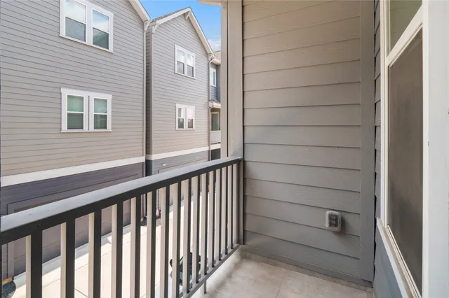 a view of a balcony with a door
