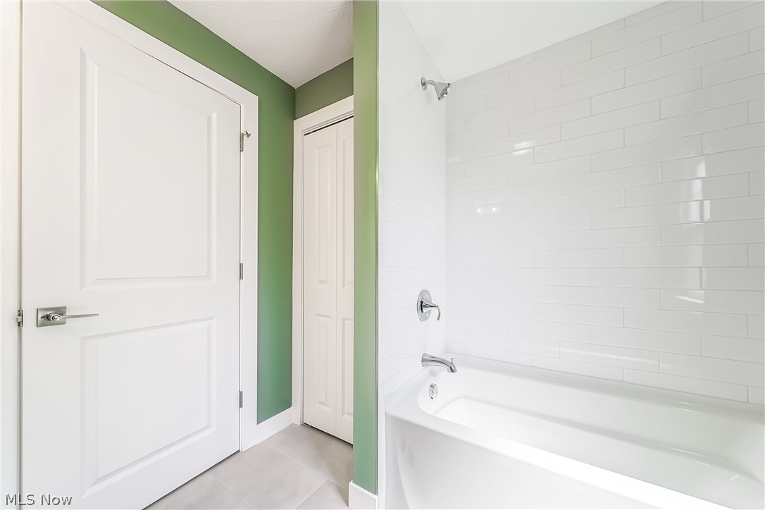 3959 Ardmore Road Cleveland Heights, OH 44121 - Photo 21 of 38 Bathroom with tiled shower / bath combo and tile floors