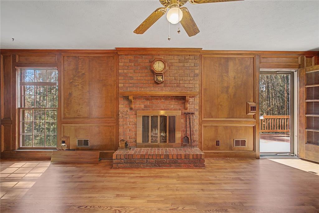5877 Millstone Run Stone Mountain, GA 30087 - Photo 16 of 71 a view of a livingroom with an empty space and a fireplace