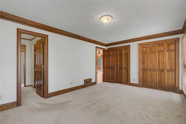 a view of an empty room with empty racks
