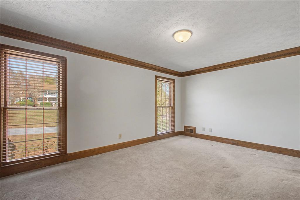 5877 Millstone Run Stone Mountain, GA 30087 - Photo 26 of 71 a view of an empty room with a window