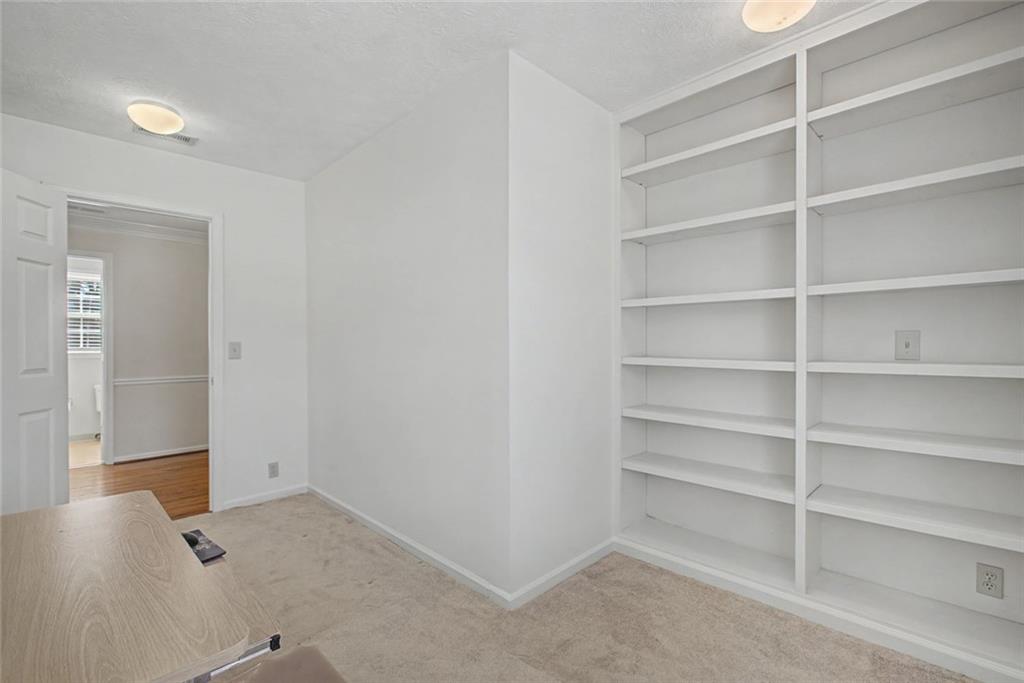 5877 Millstone Run Stone Mountain, GA 30087 - Photo 38 of 71 a view of an empty room with empty racks