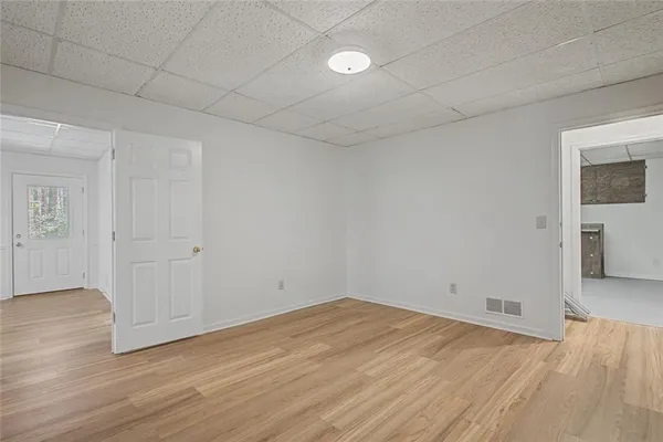 a picture of a book and a white wall