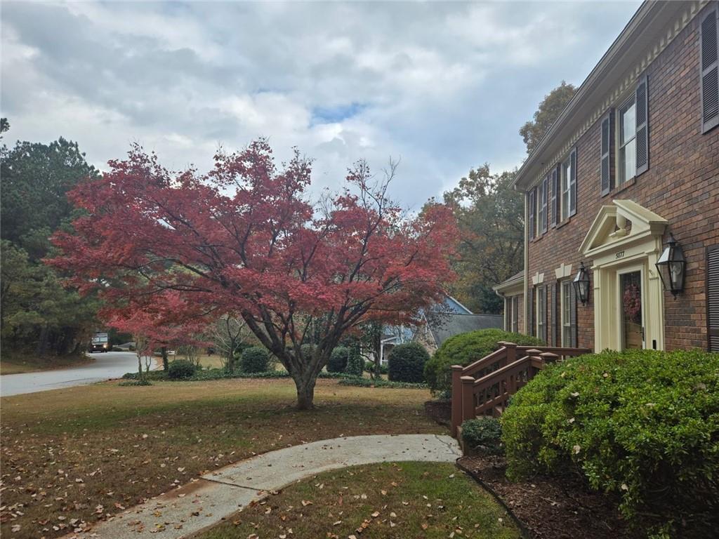 5877 Millstone Run Stone Mountain, GA 30087 - Photo 5 of 71 a view of a street with houses on both side
