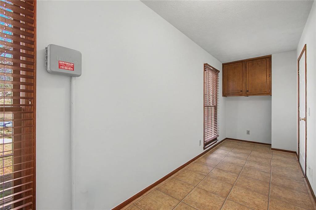 5877 Millstone Run Stone Mountain, GA 30087 - Photo 53 of 71 a view of an empty room