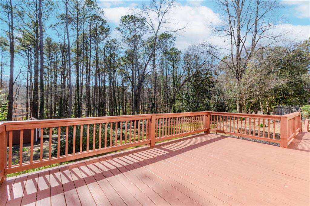 5877 Millstone Run Stone Mountain, GA 30087 - Photo 56 of 71 a view of balcony with wooden floor
