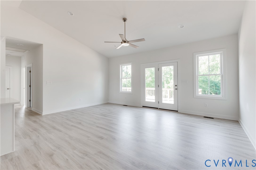 1393 Broad St Road Oilville, VA 23129 - Photo 11 of 39 Spare room with light wood-type flooring, lofted c
