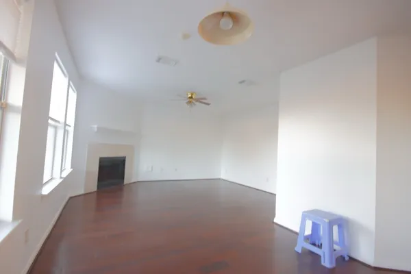 an empty room with windows