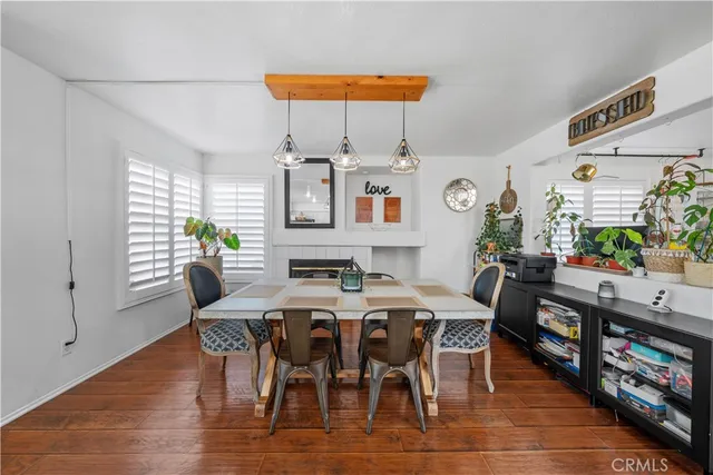 a kitchen with stainless steel appliances granite countertop sink stove and refrigerator