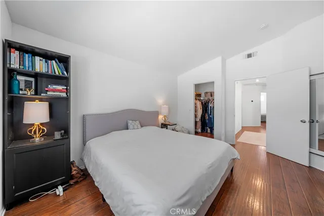 a bedroom with a bed and furniture