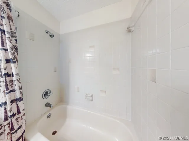 a bathroom with a bathtub