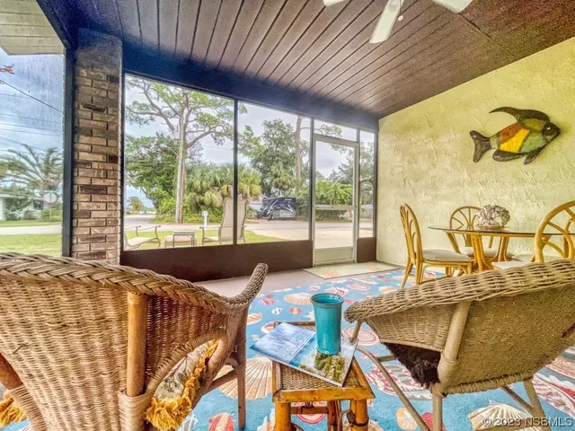 a bed room with a bed and a window