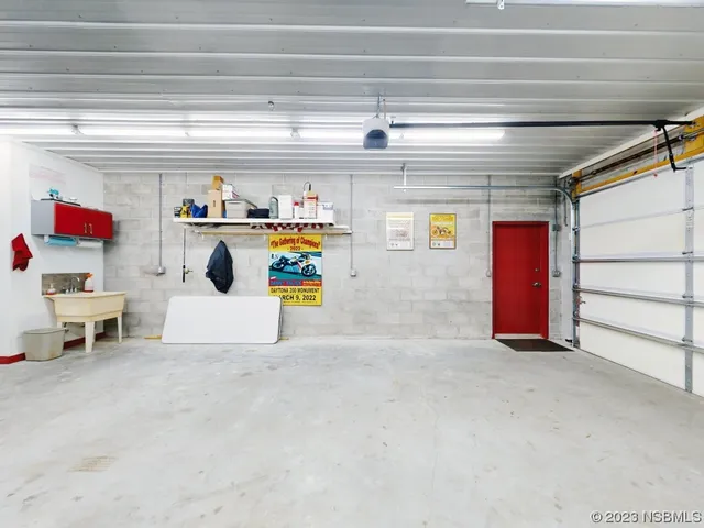 a kitchen with stainless steel appliances granite countertop a stove and cabinets