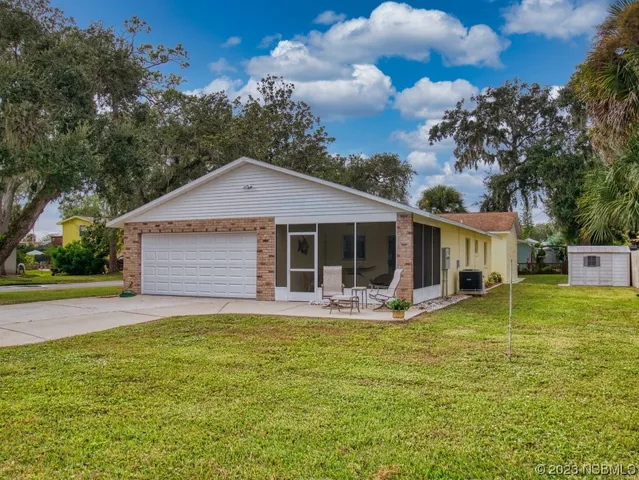 a view of a street with an outdoor space