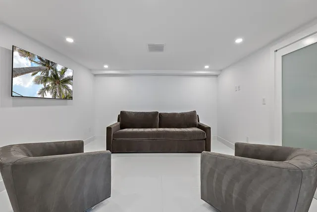 a living room with furniture and a couch