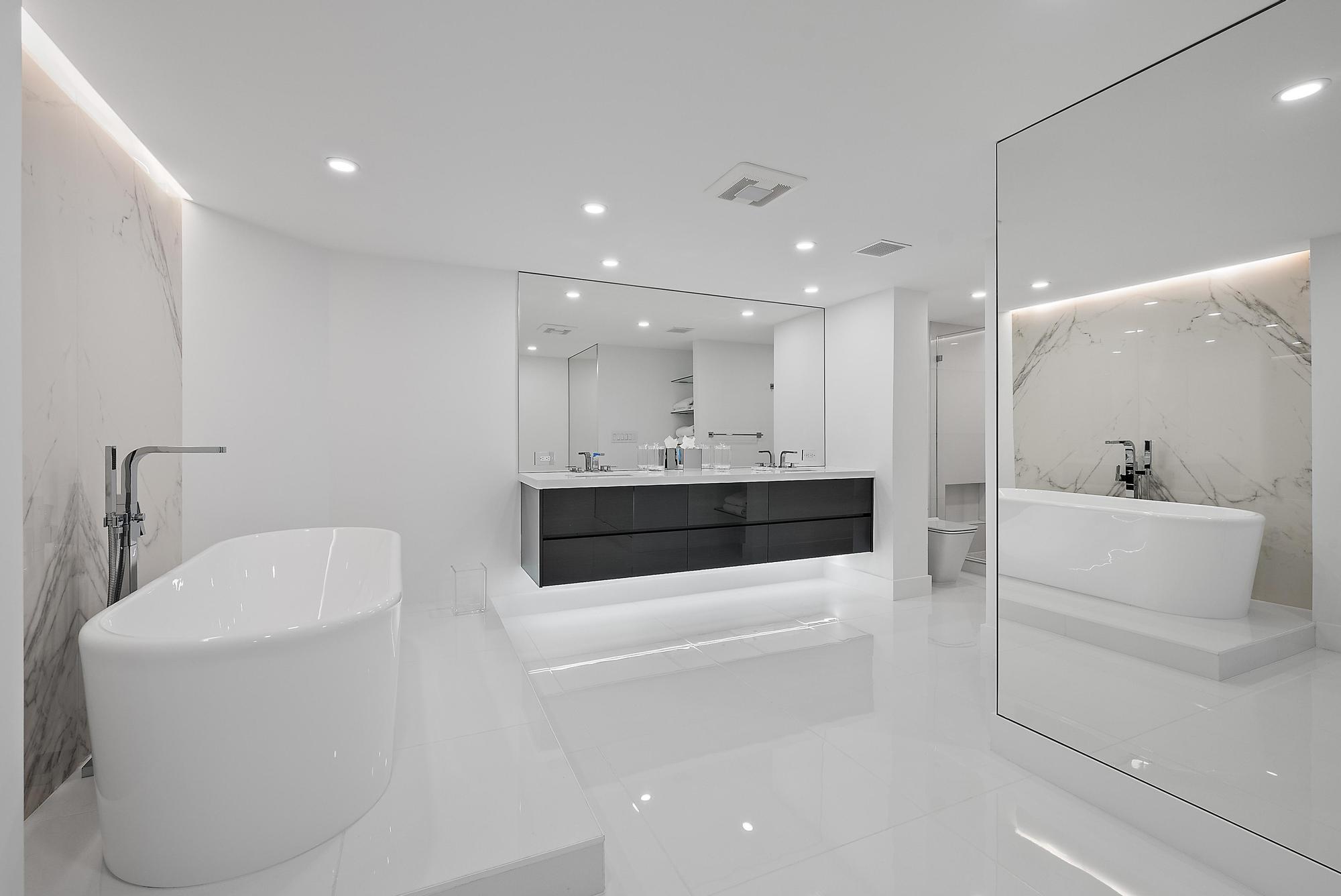 3140 South Ocean Boulevard, Unit 502S Palm Beach, FL 33480 - Photo 16 of 30 a bathroom with a sink a toilet and shower