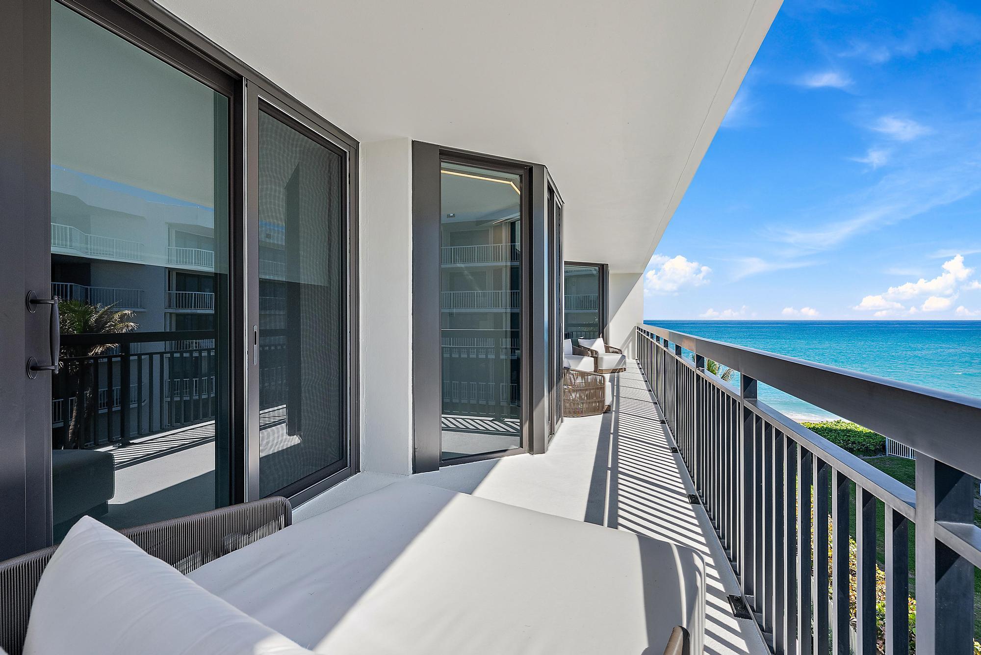 3140 South Ocean Boulevard, Unit 502S Palm Beach, FL 33480 - Photo 10 of 30 a bedroom with a bed and balcony