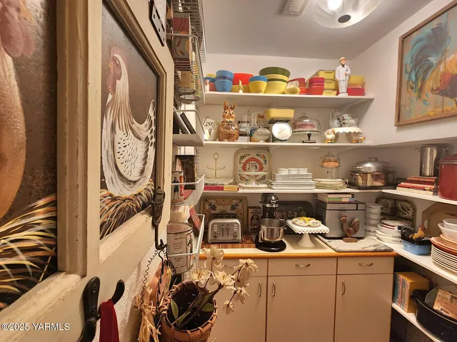 a kitchen with stainless steel appliances granite countertop a refrigerator and a stove