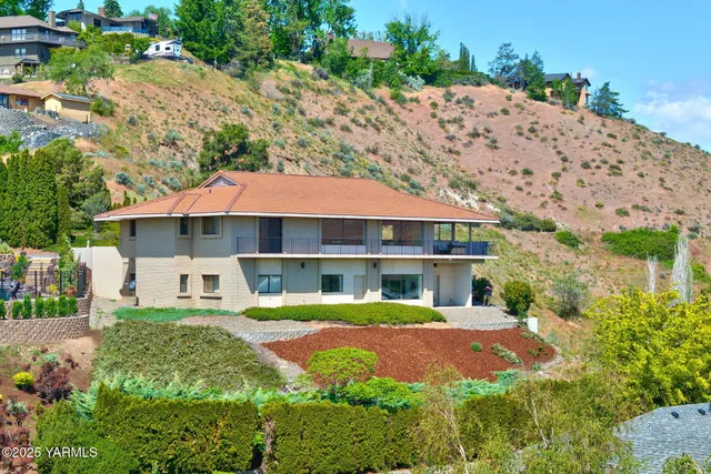 a view of living room with furniture and baby crib