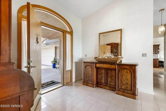 a view of a bathroom from a hallway