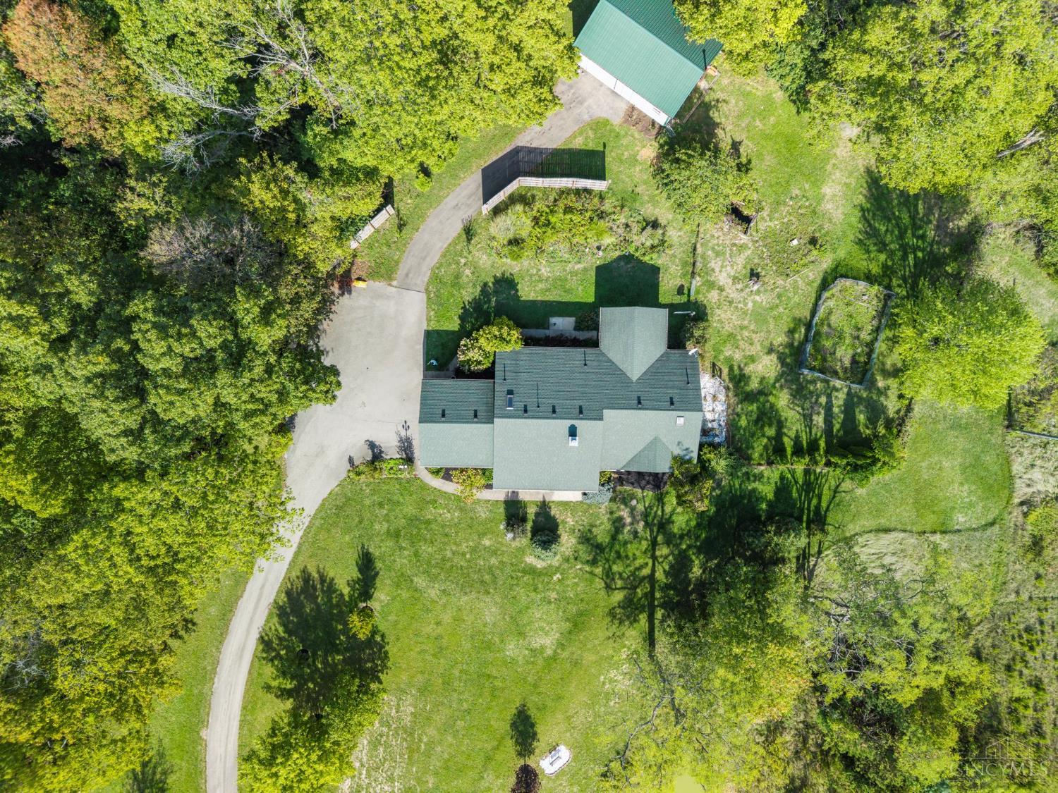 6805 Pea Ridge Road Hillsboro, OH 45133 - Photo 29 of 39 Detached 24 X 32 Pole barn with electric concrete floor could be used as a workshop, storage, or what your needs are. Bring the chickens as the to this area Bonus is a small built in chicken coop in the corner