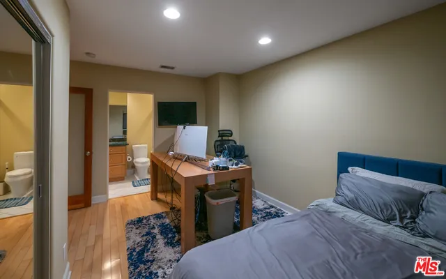 an aerial view of a house with outdoor space and lake view