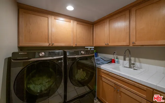 an aerial view of a city with ocean view