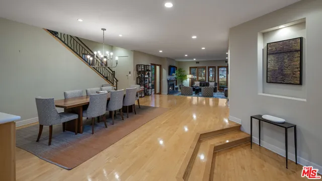 a room with furniture and a wooden floor