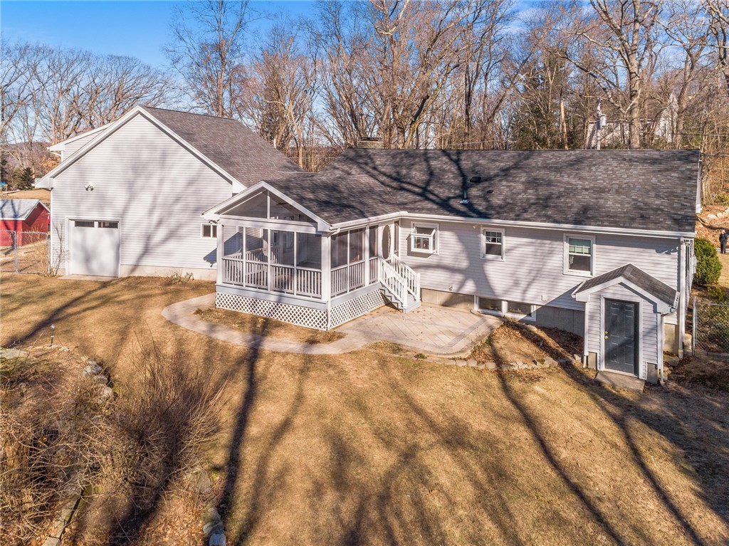 204 Hanton Road North Smithfield, RI 02896 - Photo 40 of 40 Wonderful patio, screened-in porch and walkout basement!