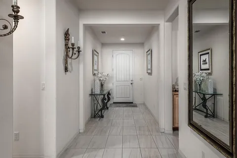 a bathroom with a shower and a sink