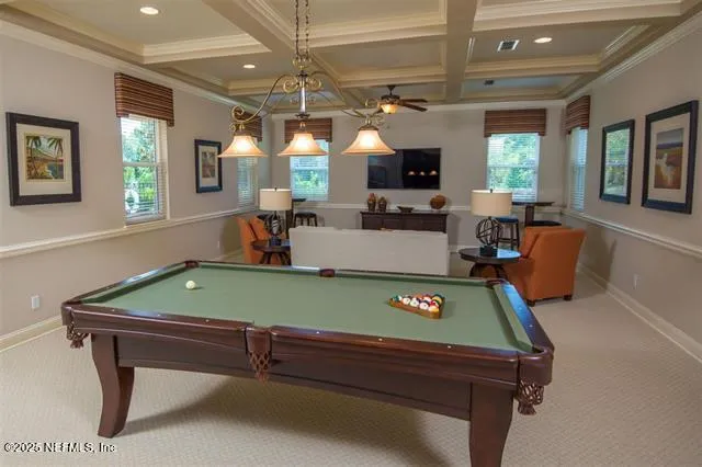 a room with furniture and a flat screen tv