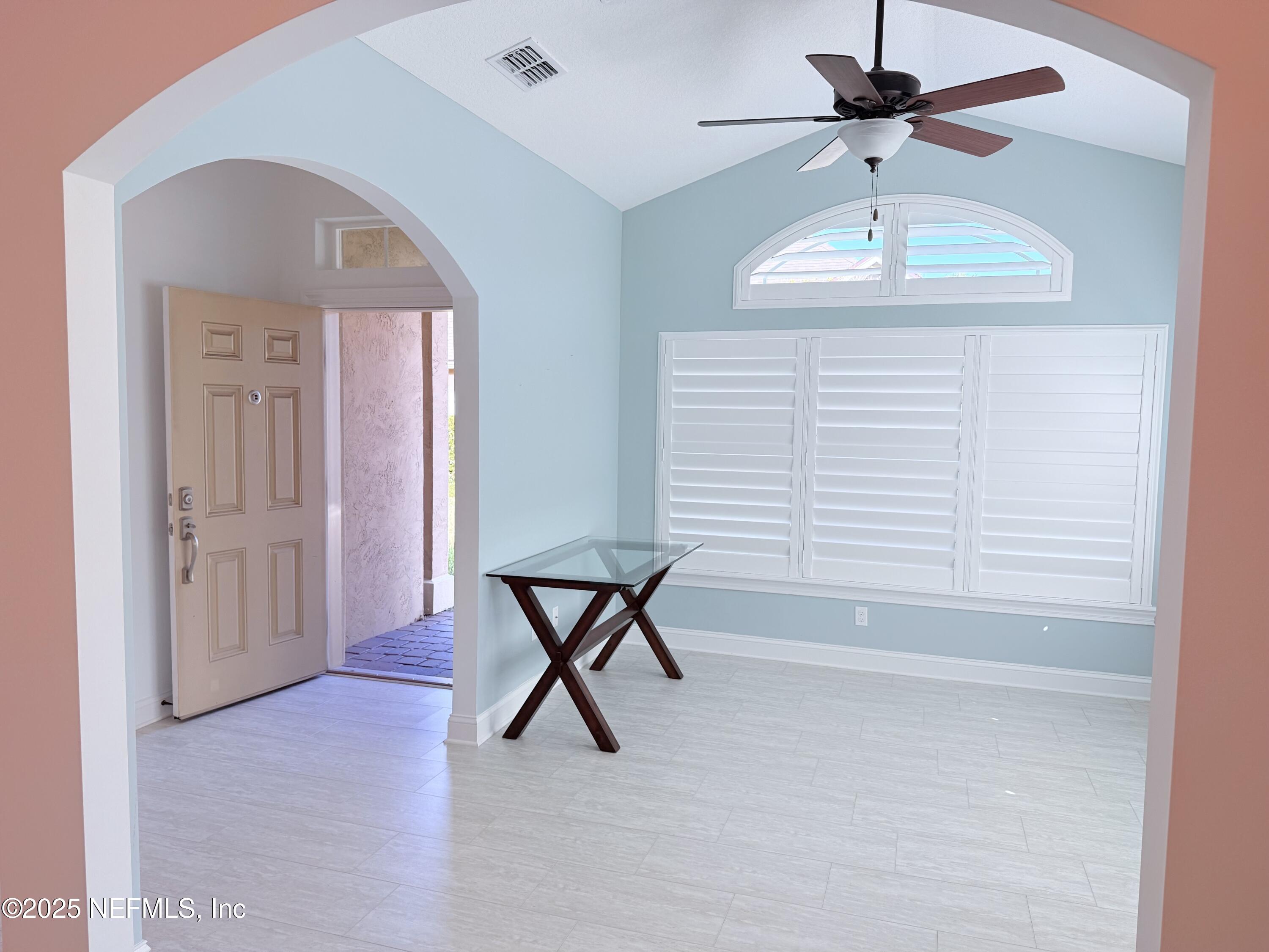 44 Ocale Court St. Augustine, FL 32084 - Photo 9 of 30 a view of hall way with furniture and chandelier fan