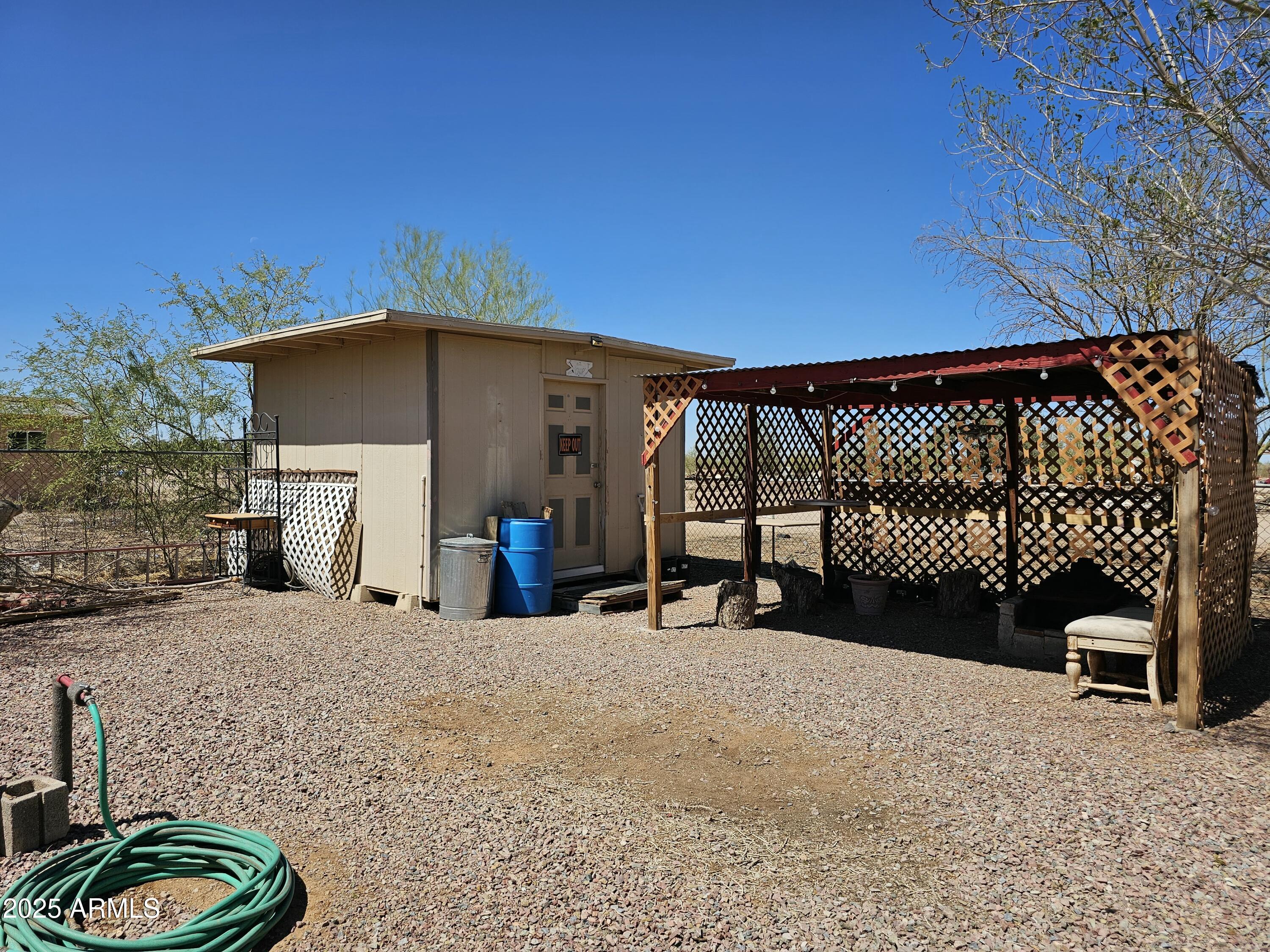 6830 East Shasta Street Picacho, AZ 85141 - Photo 14 of 19 a view of a chairs and tables in the patio