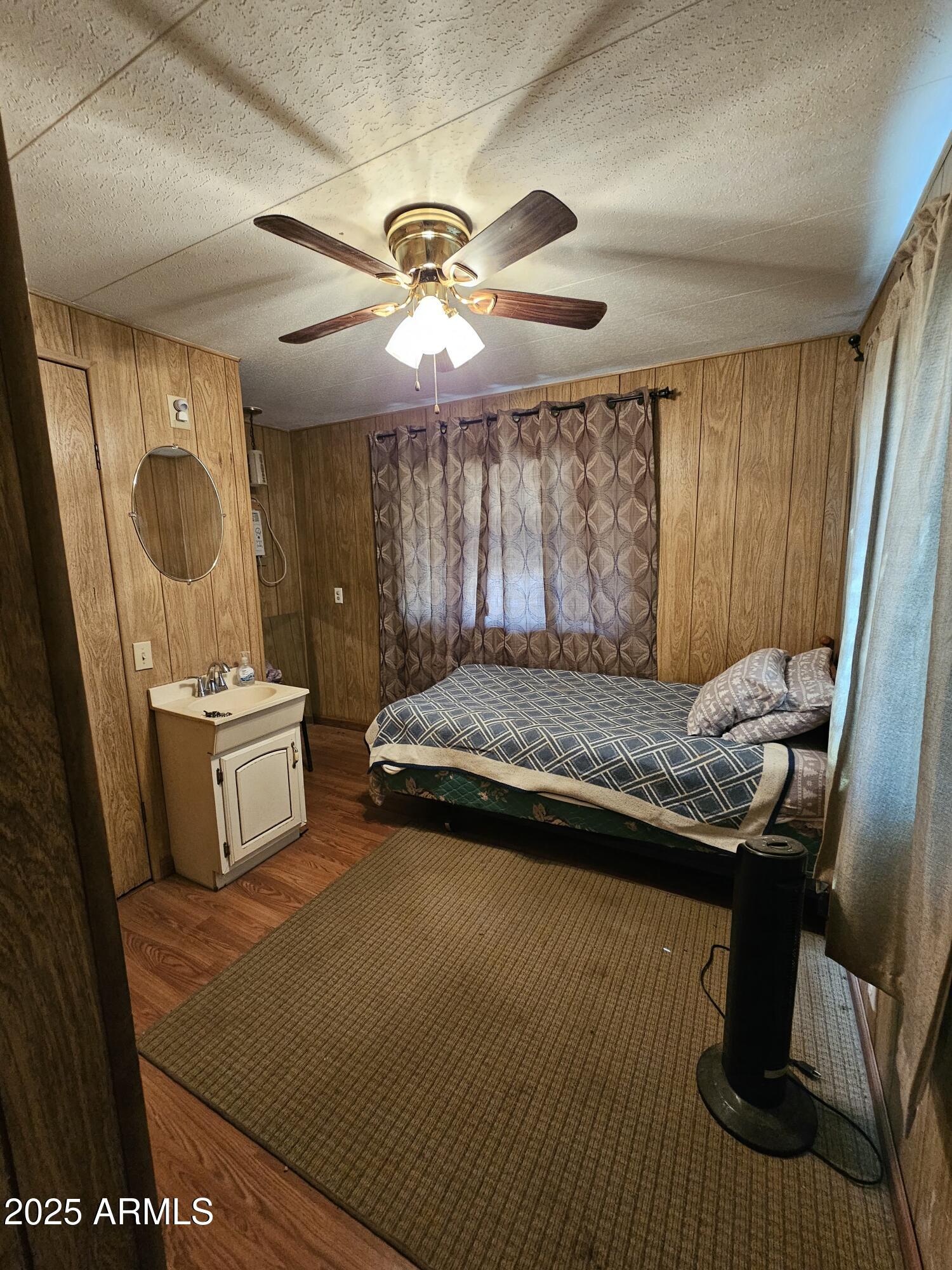 6830 East Shasta Street Picacho, AZ 85141 - Photo 8 of 19 a kitchen with a stove a sink and a refrigerator