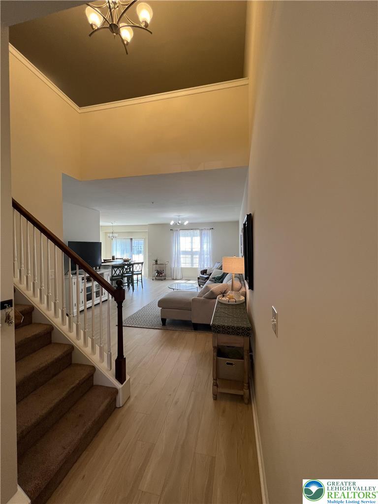 5380 Jutland Road Allentown, PA 18104 - Photo 2 of 27 Enter into a welcoming interior with high ceilings and rich wood flooring leading to the living spaces.