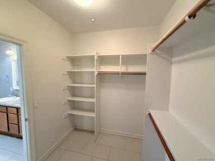 a view of an empty walk in closet