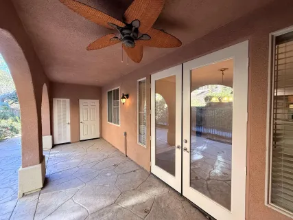 a view of a hallway with a glass door