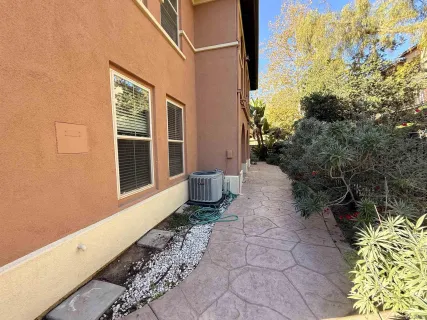 a view of a back yard of the house