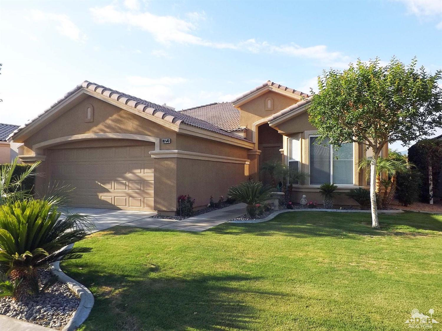 80540 Knightswood Road Indio, CA 92201 - Photo 1 of 34 a house with swimming pool in front of it