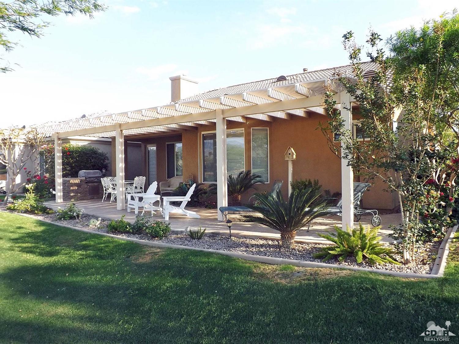 80540 Knightswood Road Indio, CA 92201 - Photo 26 of 34 a view of a house with a patio