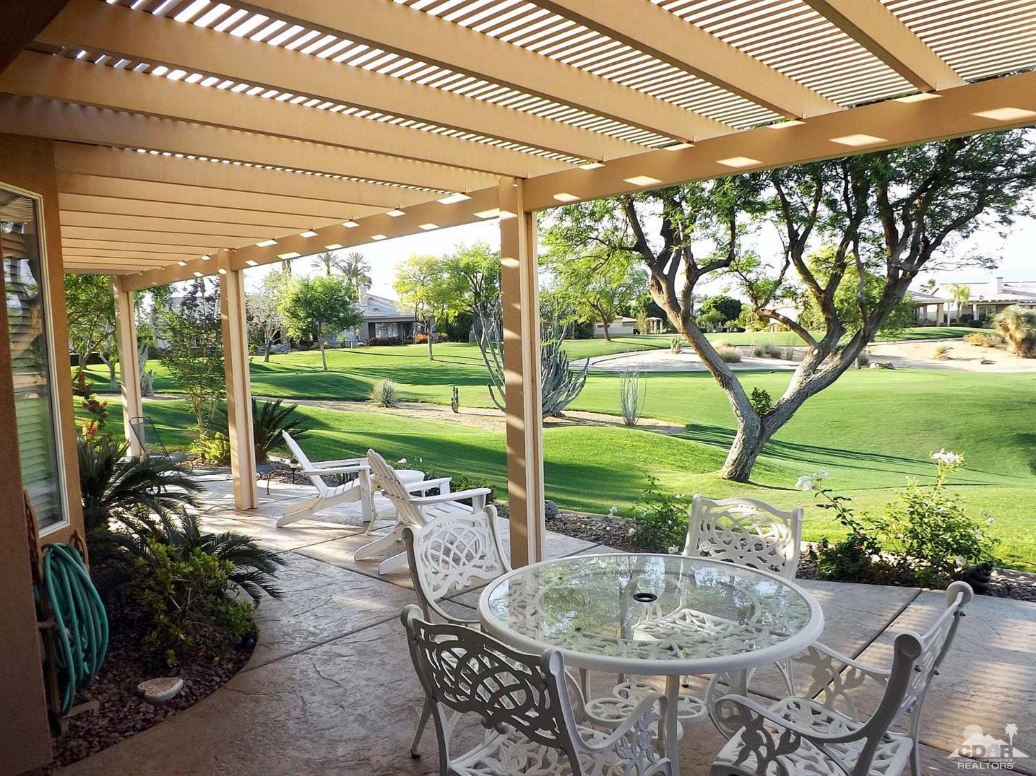 80540 Knightswood Road Indio, CA 92201 - Photo 3 of 34 a patio with yard table and chairs