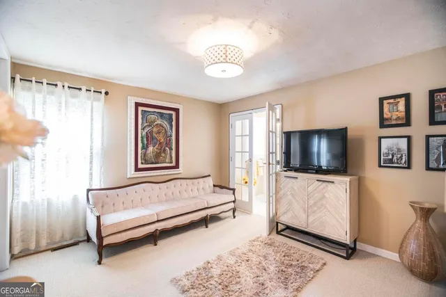 a bathroom with a sink mirror vanity and toilet