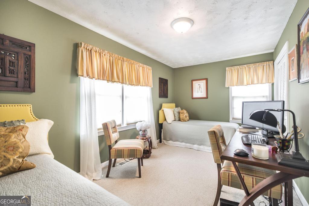 209 Spillers Street Fort Valley, GA 31030 - Photo 22 of 36 a living room with furniture and a window